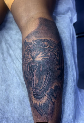 The Cajun Picasso Tattoo Shop in Arlington